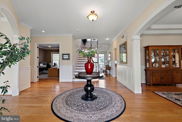 107 Centrenest Ln, Wilmington, DE 19807 - foyer with stairs, ornamental molding, light wood finished floors, and visible vents