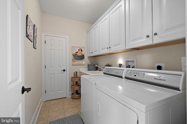 107 Centrenest Ln, Wilmington, DE 19807 - laundry room featuring a sink, cabinet space, independent washer and dryer, light tile patterned floors, and baseboards