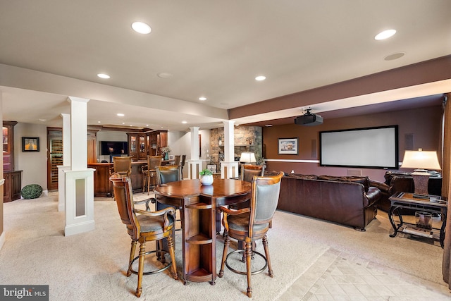 107 Centrenest Ln, Wilmington, DE 19807 - dining area with light colored carpet, recessed lighting, bar area, and decorative columns