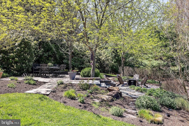 107 Centrenest Ln, Wilmington, DE 19807 - view of yard featuring a patio area and a fire pit