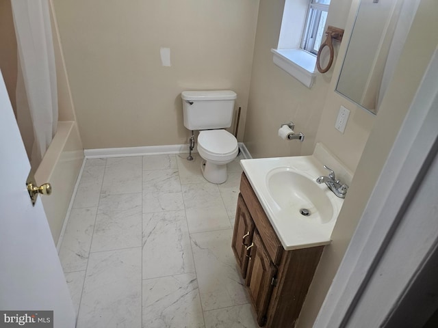 full bathroom with marble finish flooring, baseboards, toilet, and vanity
