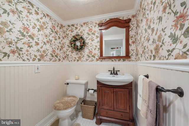 832 Muller Rd, Westminster, MD 21157 - half bathroom with wallpapered walls, vanity, toilet, and ornamental molding