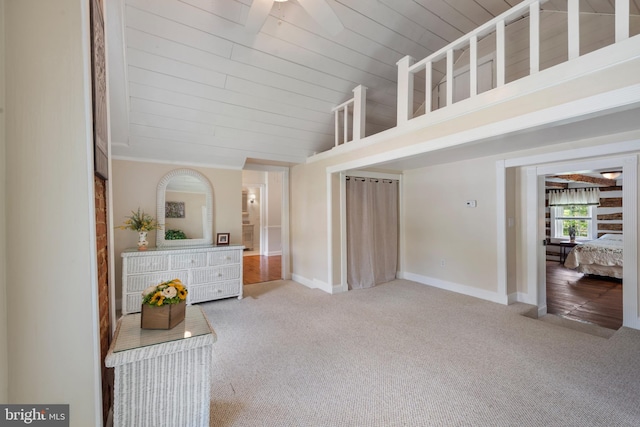 832 Muller Rd, Westminster, MD 21157 - unfurnished living room with carpet floors, ceiling fan, baseboards, wood ceiling, and vaulted ceiling
