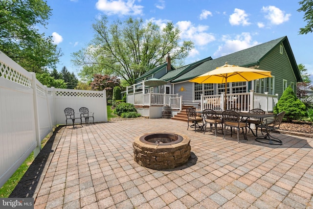 832 Muller Rd, Westminster, MD 21157 - view of patio / terrace featuring an outdoor fire pit, a deck, fence, and outdoor dining space