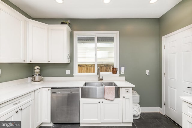 kitchen with white cabinets, dishwasher, recessed lighting, and a sink