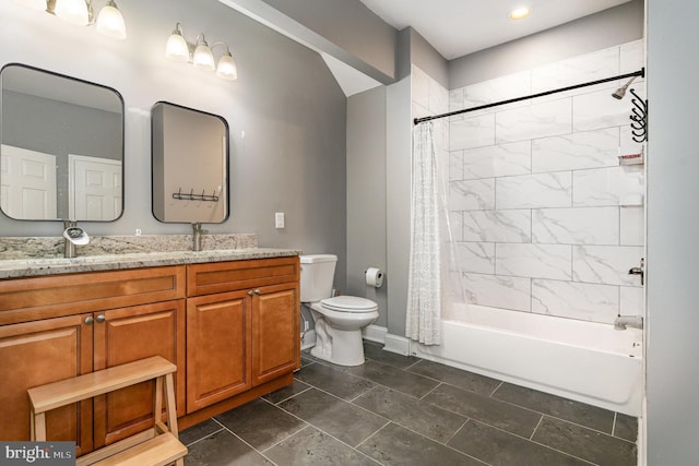 bathroom with toilet, baseboards, shower / tub combo, and vanity