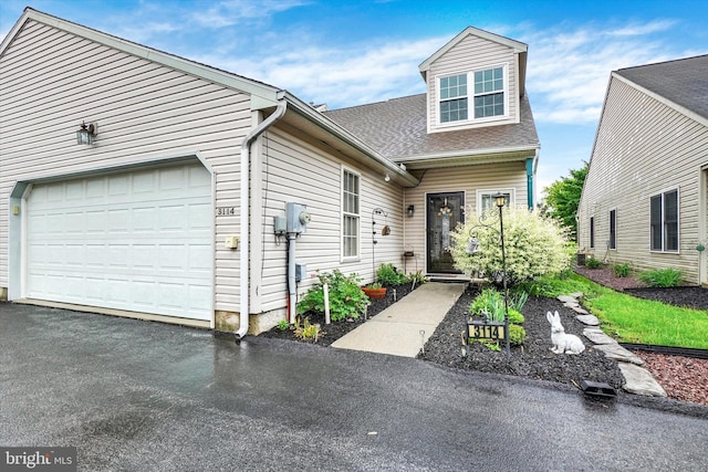 3114 Harmony Rose Ct, Dover, PA 17315 - view of front facade with an attached garage, a shingled roof, and asphalt driveway