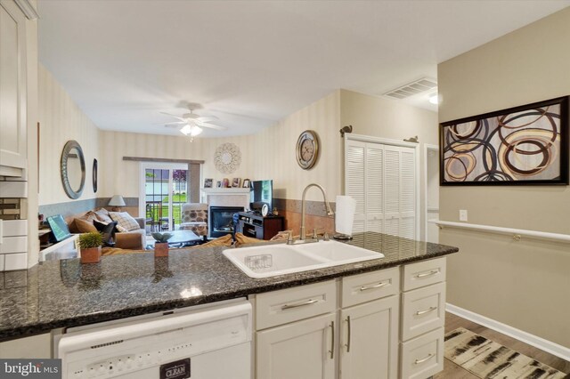 3114 Harmony Rose Ct, Dover, PA 17315 - kitchen featuring white dishwasher, a sink, open floor plan, ceiling fan, and light wood-type flooring