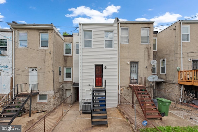 3011 W Lanvale St, Baltimore, MD 21216 - view of front facade with fence and cooling unit