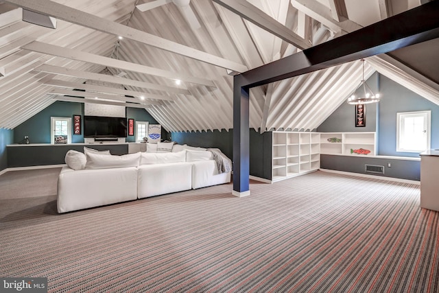 carpeted living room featuring baseboards, visible vents, and vaulted ceiling with beams