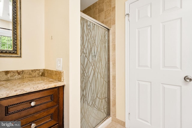 bathroom with a shower stall