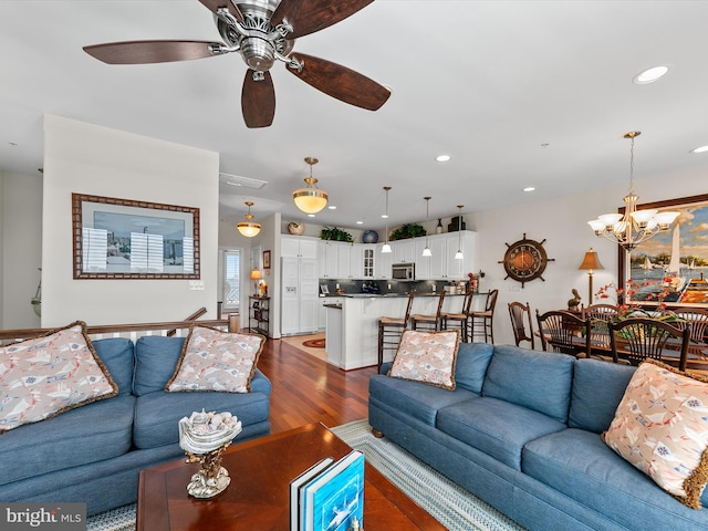 13000 Marina View Ln Unit 25, Ocean City, MD 21842 - living room featuring ceiling fan, wood finished floors, recessed lighting, and a chandelier