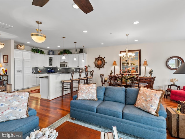 13000 Marina View Ln Unit 25, Ocean City, MD 21842 - living room featuring ceiling fan, wood finished floors, recessed lighting, and a chandelier