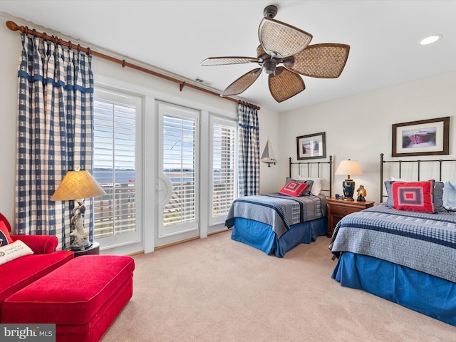 13000 Marina View Ln Unit 25, Ocean City, MD 21842 - carpeted bedroom featuring access to exterior, recessed lighting, and ceiling fan