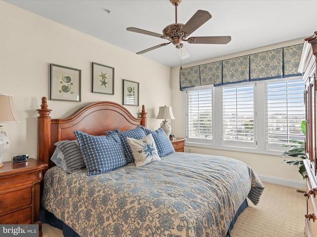 13000 Marina View Ln Unit 25, Ocean City, MD 21842 - carpeted bedroom featuring baseboards and ceiling fan