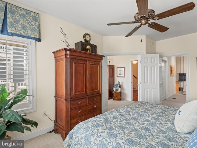 13000 Marina View Ln Unit 25, Ocean City, MD 21842 - bedroom featuring light colored carpet, baseboards, and ceiling fan