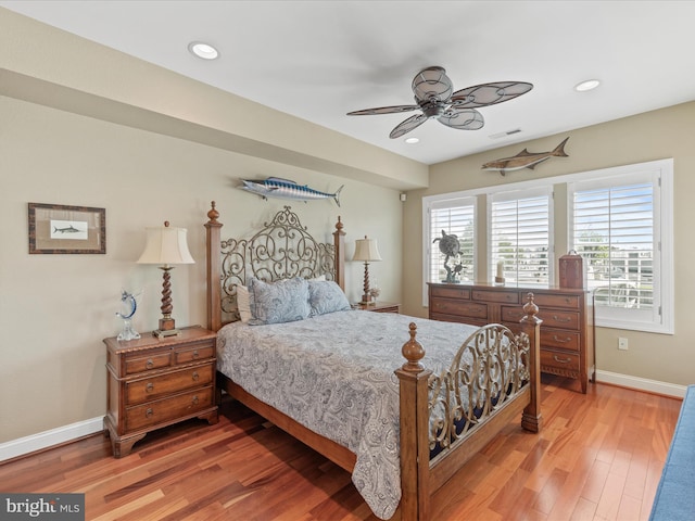13000 Marina View Ln Unit 25, Ocean City, MD 21842 - bedroom featuring light wood finished floors, baseboards, recessed lighting, and a ceiling fan