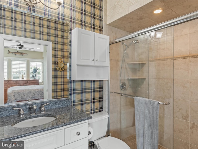 13000 Marina View Ln Unit 25, Ocean City, MD 21842 - bathroom featuring ensuite bathroom, a stall shower, vanity, toilet, and wallpapered walls