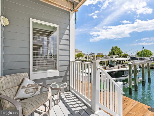 13000 Marina View Ln Unit 25, Ocean City, MD 21842 - balcony featuring a boat dock, a water view, and boat lift
