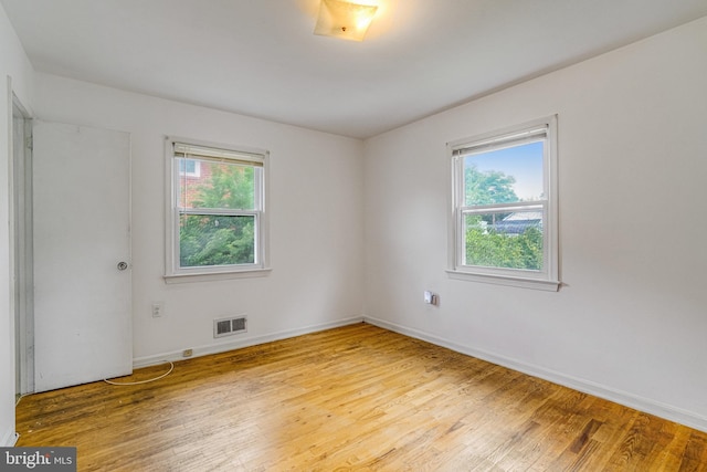 3515 19th St S, Arlington, VA 22204 - spare room with light wood-style flooring and baseboards