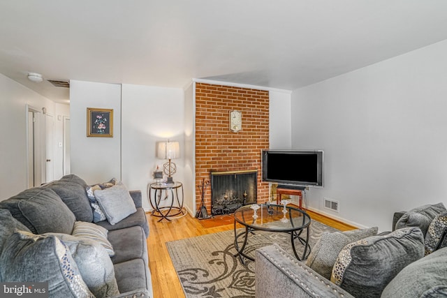 3515 19th St S, Arlington, VA 22204 - living area with wood finished floors and a fireplace