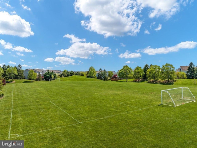 view of home's community featuring a sport area