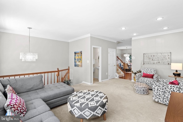 living room with a chandelier, ornamental molding, carpet flooring, baseboards, and recessed lighting