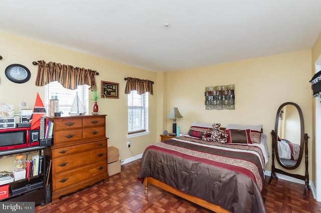 bedroom with baseboards