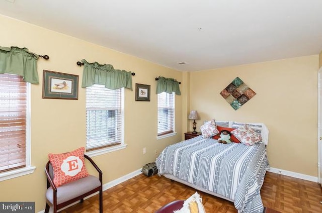 bedroom with baseboards