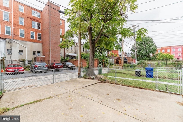 view of property's community with fence