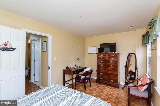 bedroom with baseboards