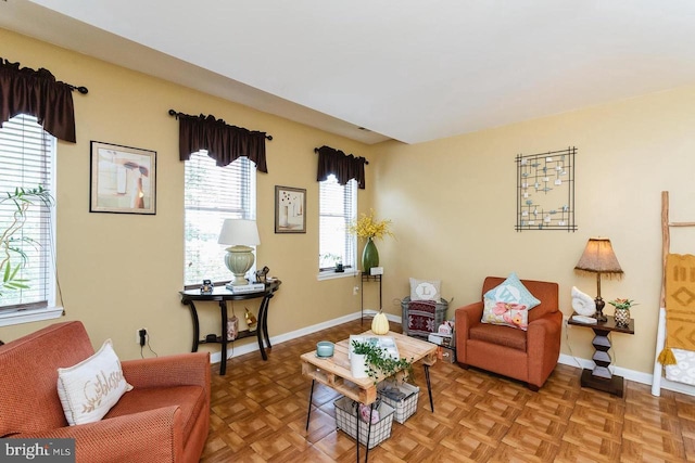 living room featuring baseboards