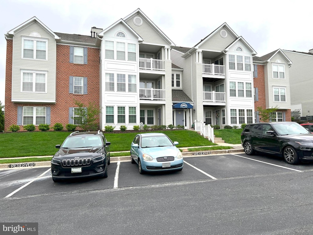 4541 Aspen Mill Rd Unit 4541, Baltimore, MD 21236 - view of building exterior with uncovered parking