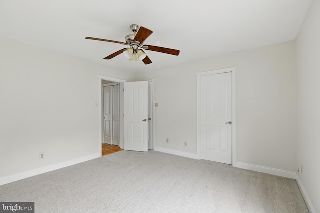 12473 Turtle Dove Pl, Waldorf, MD 20602 - unfurnished bedroom with carpet flooring, baseboards, and a ceiling fan