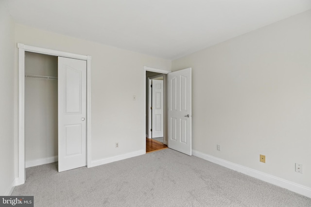 12473 Turtle Dove Pl, Waldorf, MD 20602 - unfurnished bedroom featuring carpet, baseboards, and a closet