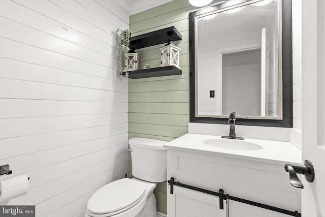2 Bunting Bridge Rd, Cookstown, NJ 08511 - half bathroom featuring wood walls, toilet, crown molding, and vanity
