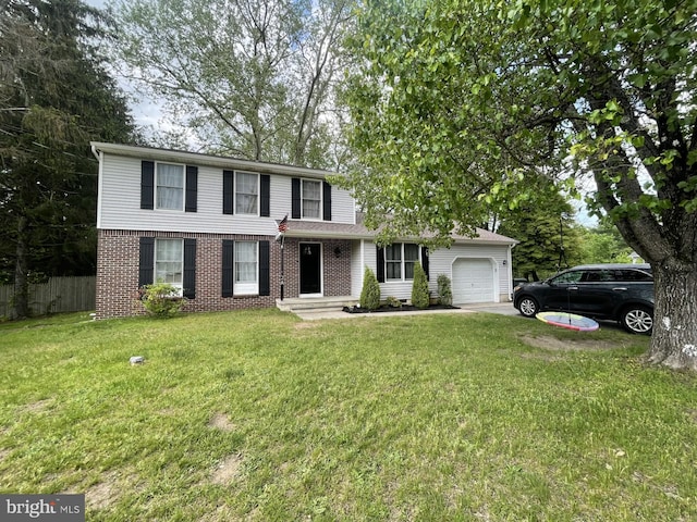 traditional home with a front yard, brick siding, fence, and a garage