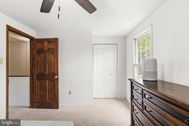 2 Bunting Bridge Rd, Cookstown, NJ 08511 - bedroom featuring light colored carpet, a textured ceiling, a closet, and a ceiling fan