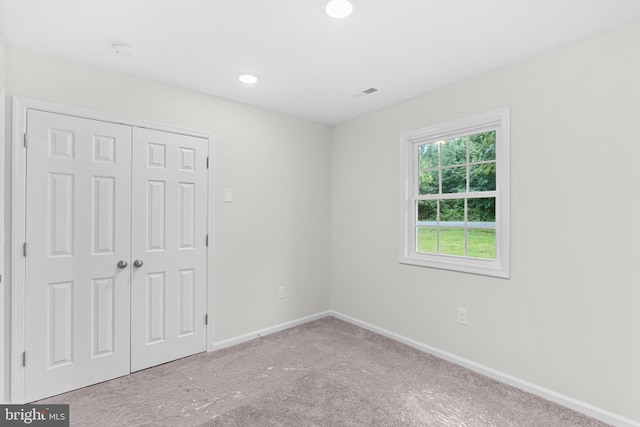 23167 File Rd, Bowling Green, VA 22427 - unfurnished bedroom with carpet, a closet, and recessed lighting