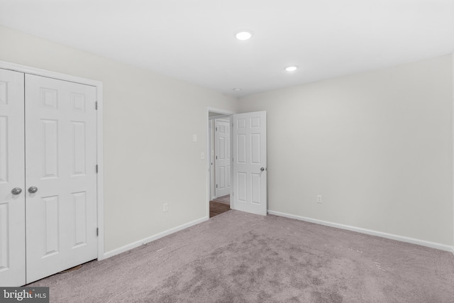 23167 File Rd, Bowling Green, VA 22427 - unfurnished bedroom featuring carpet, a closet, and recessed lighting