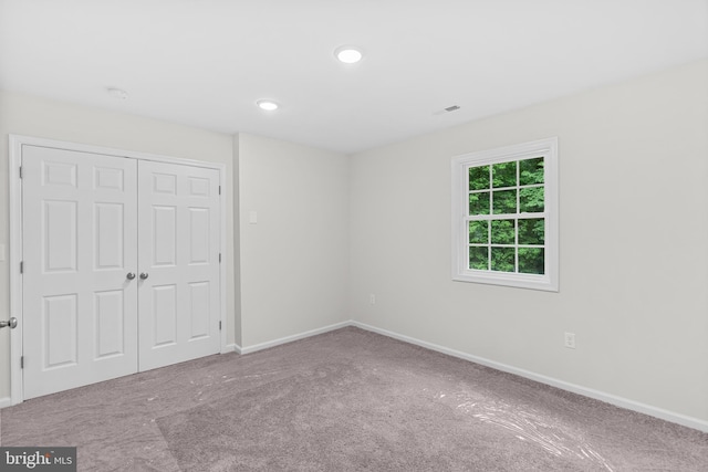 23167 File Rd, Bowling Green, VA 22427 - unfurnished bedroom with carpet flooring, a closet, and recessed lighting