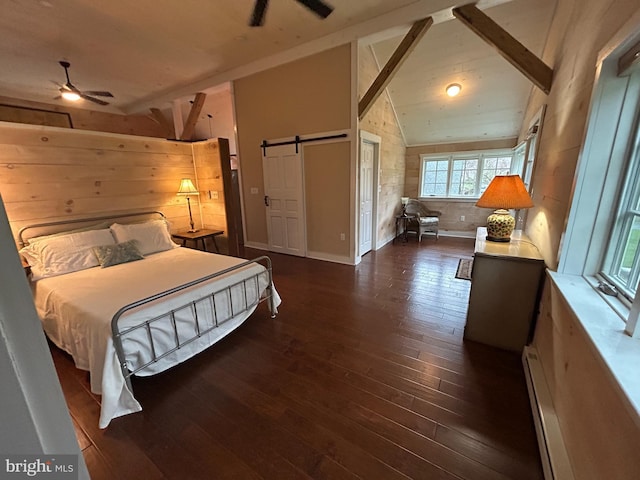 bedroom featuring a baseboard heating unit, a barn door, dark wood-style flooring, wooden walls, and vaulted ceiling with beams