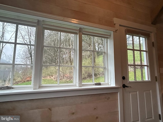 doorway to outside featuring plenty of natural light