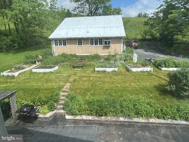 exterior space with a garden