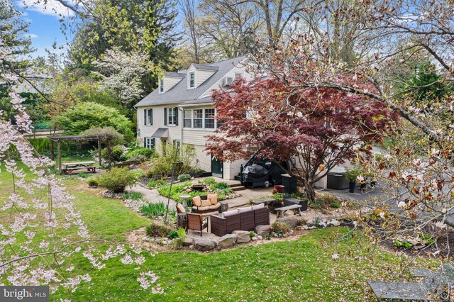 view of yard with a patio and an outdoor living space
