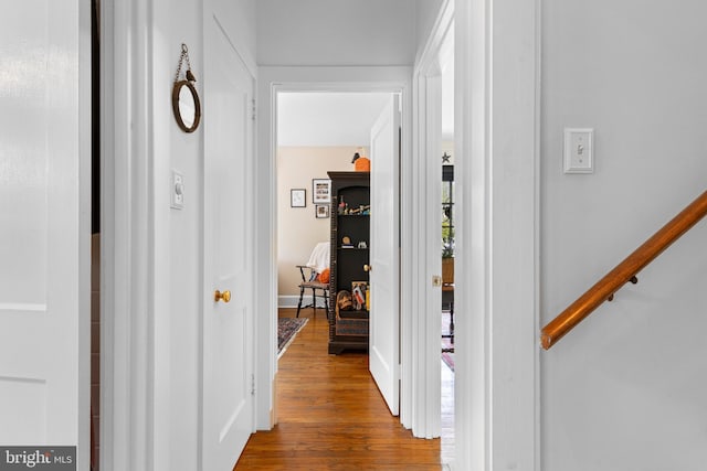 hall featuring wood finished floors