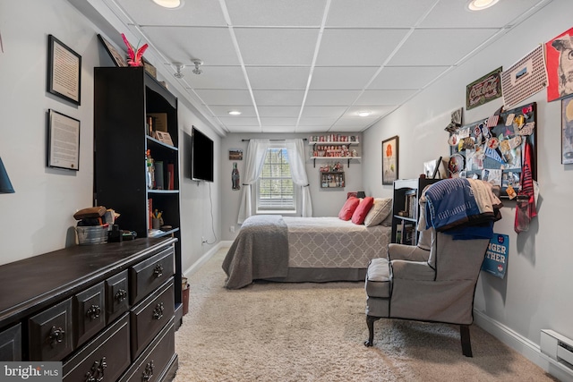 bedroom featuring carpet floors, baseboards, baseboard heating, and recessed lighting