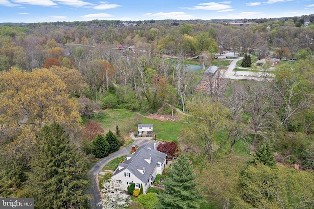 drone / aerial view with a forest view