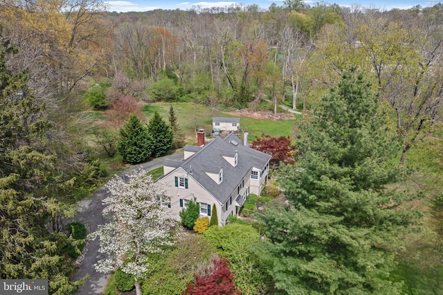 drone / aerial view with a forest view