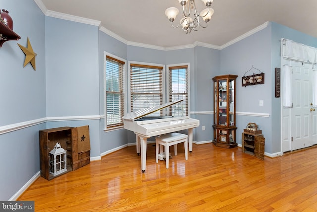 3 Oleander Dr, Stafford, VA 22554 - dining area featuring baseboards, ornamental molding, a chandelier, and light wood-style flooring